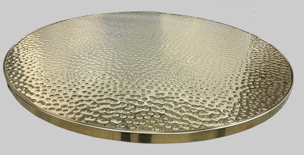 Hammered Brass Table Top – Handcrafted Elegance - Designs 05 Round hammered brass table tops with a reflective textured surface, handcrafted for a unique artisanal look