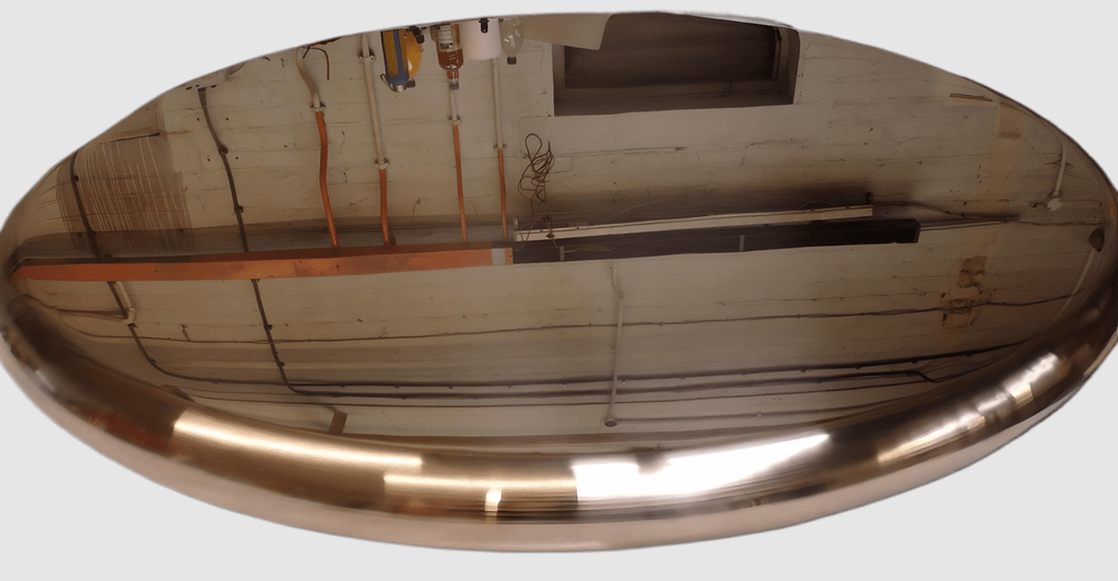 Mirror-Finish Copper Table Top – Bull-Nose Edge Design - Designs 05 Bull-nose round mirror copper table top with a highly reflective polished finish, showcasing premium craftsmanship