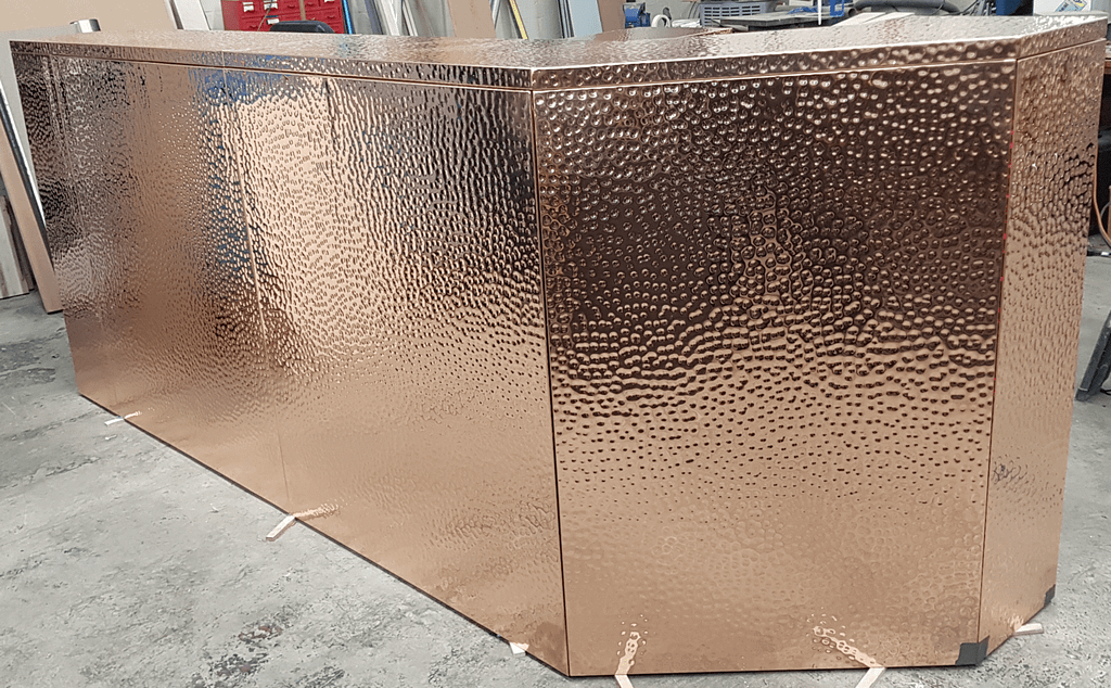 Hammered Copper Barfront | In Workshop - Designs 05 Hammered copper barfront in workshop during fabrication