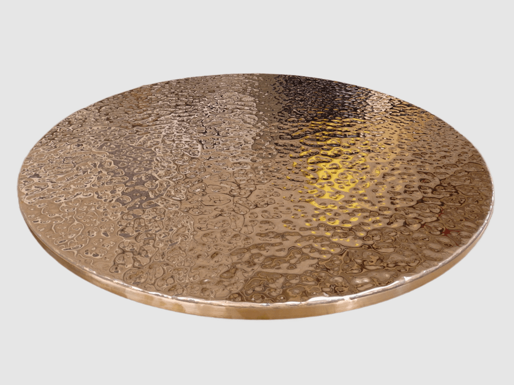 Round Hammered Copper Table Top Round hammered copper table top with a rustic texture.