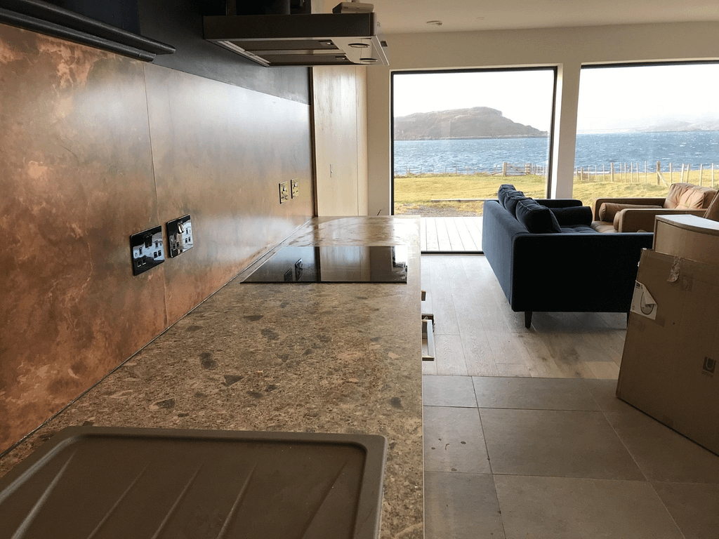 Copper-Kitchen-Splashback-with-view - Designs 05 Bespoke brass and copper interior feature